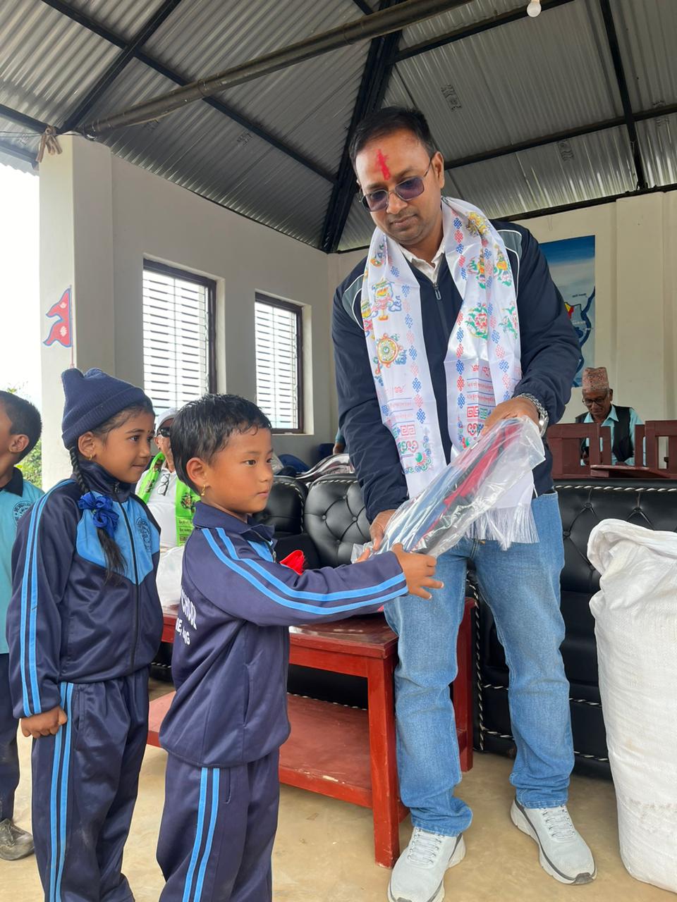 Computer and school bags handover at Baglung